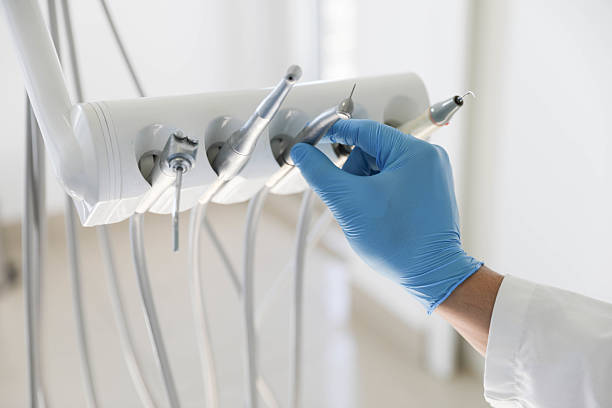 Professional Tooth Extraction technician working in March ARB, CA